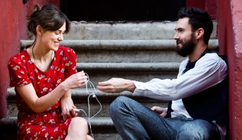 (L-R) KEIRA KNIGHTLEY and ADAM LEVINE star in CAN A SONG SAVE YOUR LIFE?