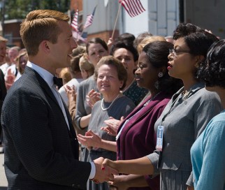 John Glenn (Glen Powell) meets the "computers," the female mathematicians with whom he would come to trust his life. 