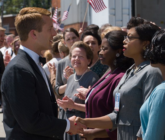 John Glenn (Glen Powell) meets the "computers," the female mathematicians with whom he would come to trust his life. 